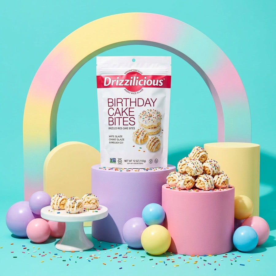 Drizzilicious Birthday Cake Bites styled on colorful pastel stands
